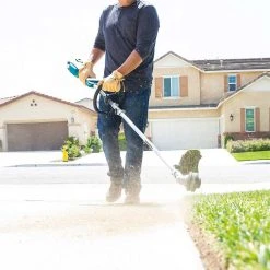 Makita XUX02SM1X1 18V LXT Li-Ion Couple Shaft Power Head Kit W/ 13" Attachment Lawn & Outdoor Power